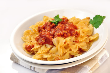 italian pasta - farfalle with meat and tomato sauce