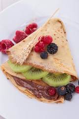 crepe with berry fruit and chocolate