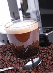 coffee marker with cup and coffee bean