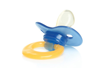 Pacifier close-up on white background.