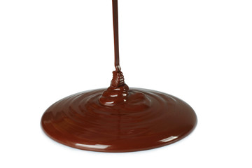 Chocolate flow on white background.