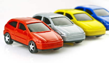 Fototapeta na wymiar toy cars made ​​of plastic