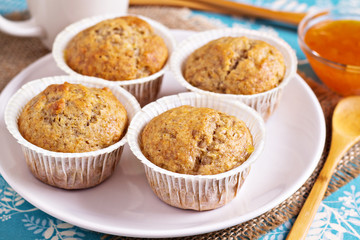 Fresh vegan banana muffins on a plate