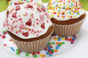 Two easter cakes on the white plate