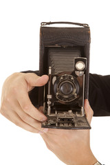 camera hold in hands close up