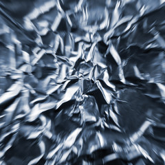 Zoom tunnel, crumpled silver aluminum foil closeup background