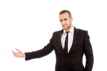 Young business man presenting over white background