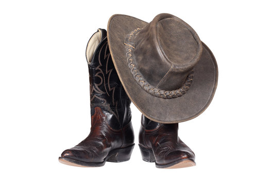 Cowboy boots and hat isolated with clipping path