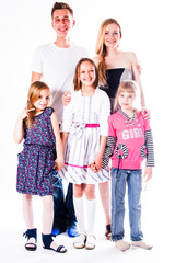 Obraz premium Happy family of parents and young children