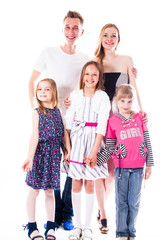 Obraz premium Happy family of parents and young children