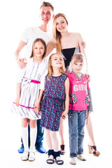 Fototapeta premium Happy family of parents and young children