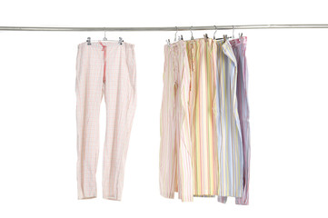 Variety of casual fashion leisure trousers on a hanger