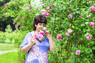 Obraz premium Woman in garden