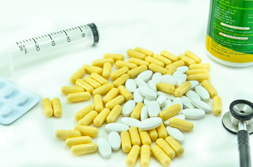 Medical: Pills , Syringe and Stethoscope