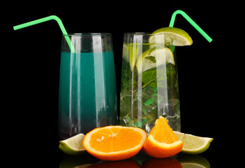 Two cocktails isolated on black