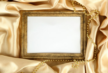 empty frame on beautiful silk