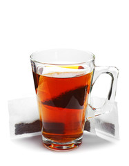 Glass tea cup and tea bags