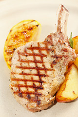 Grilled meat ribs with potatoes