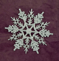 Silver glitter snowflake decoration.