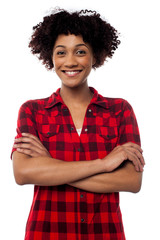 Young woman in casuals, arms crossed