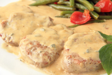 Veal in a creamy sauce closeup