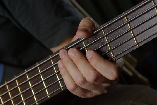 Man playing an bass guitar