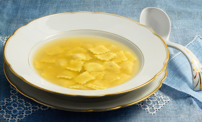 broth with ravioli