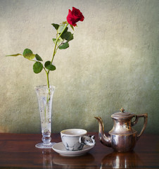 Espresso for one and red rose