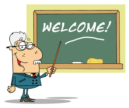 Senior School Teacher Pointing To A Welcome Chalkboard