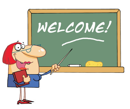 Woman Teacher Pointing To A Welcome Chalkboard