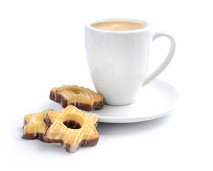 Cup of coffee with a chocolate cookies on a white background