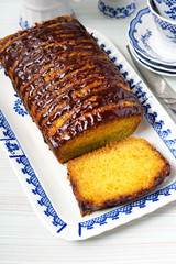 Jaffa drizzle loaf. Orange cake with chocolate glaze