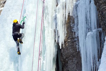 Ice climbing the waterfall.
