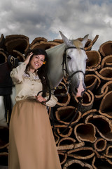 Fototapeta na wymiar classical girl with a white horse