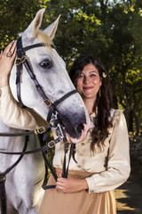Obraz premium classical girl with a white horse