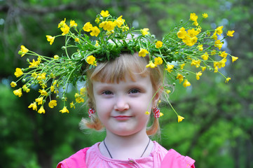 Girl in a wreath of buttercups