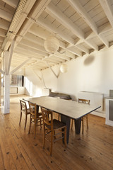 wide open space, beams and wooden floor
