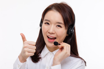 Smiling call center operator business woman show thumbs 