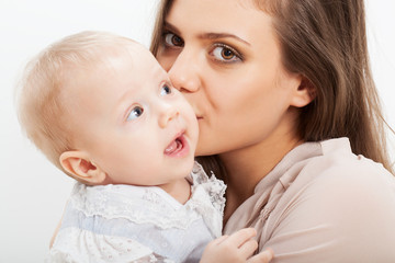 mother and baby closeup portrait