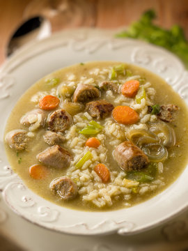 soup with rice and sausage, selective focus
