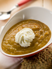 lentils cream soup with yogurt cream, selective focus