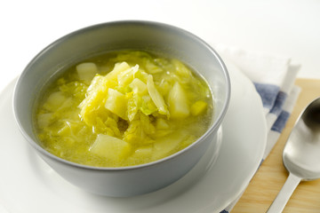 Savoy cabbage soup with potatoes and leek