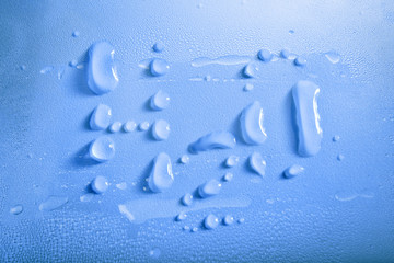 water drops H2O on blue background
