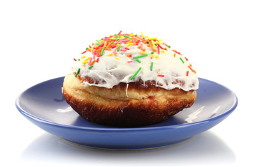 Tasty donut on color plate isolated on white