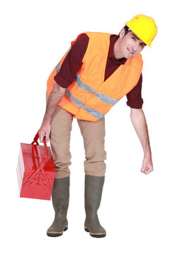 Construction Worker Lifting Something Heavy