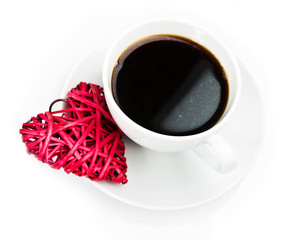 Red straw heart and cup of coffee