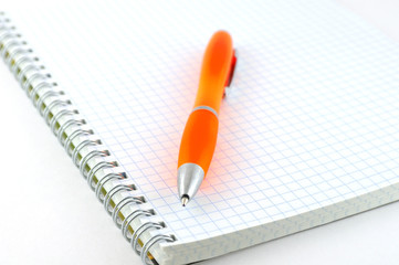 Orange pen with copy-book