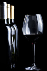 Bottles and glass of wine