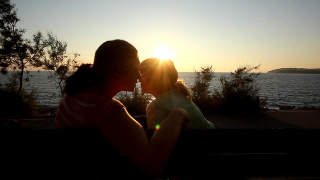 Child kissing mother