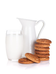 Milk jug, glass and cookies